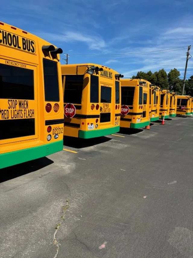 Fleet of electric school buses served by PositivEnergy charging infrastructure